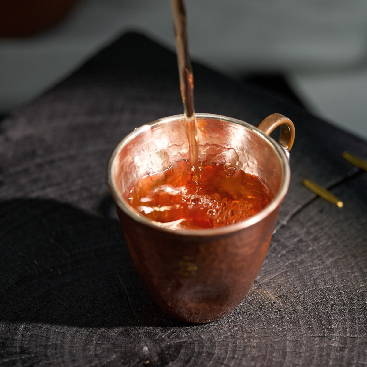 Styled tea scene featuring Feizi Xiao Wuyi Black Tea