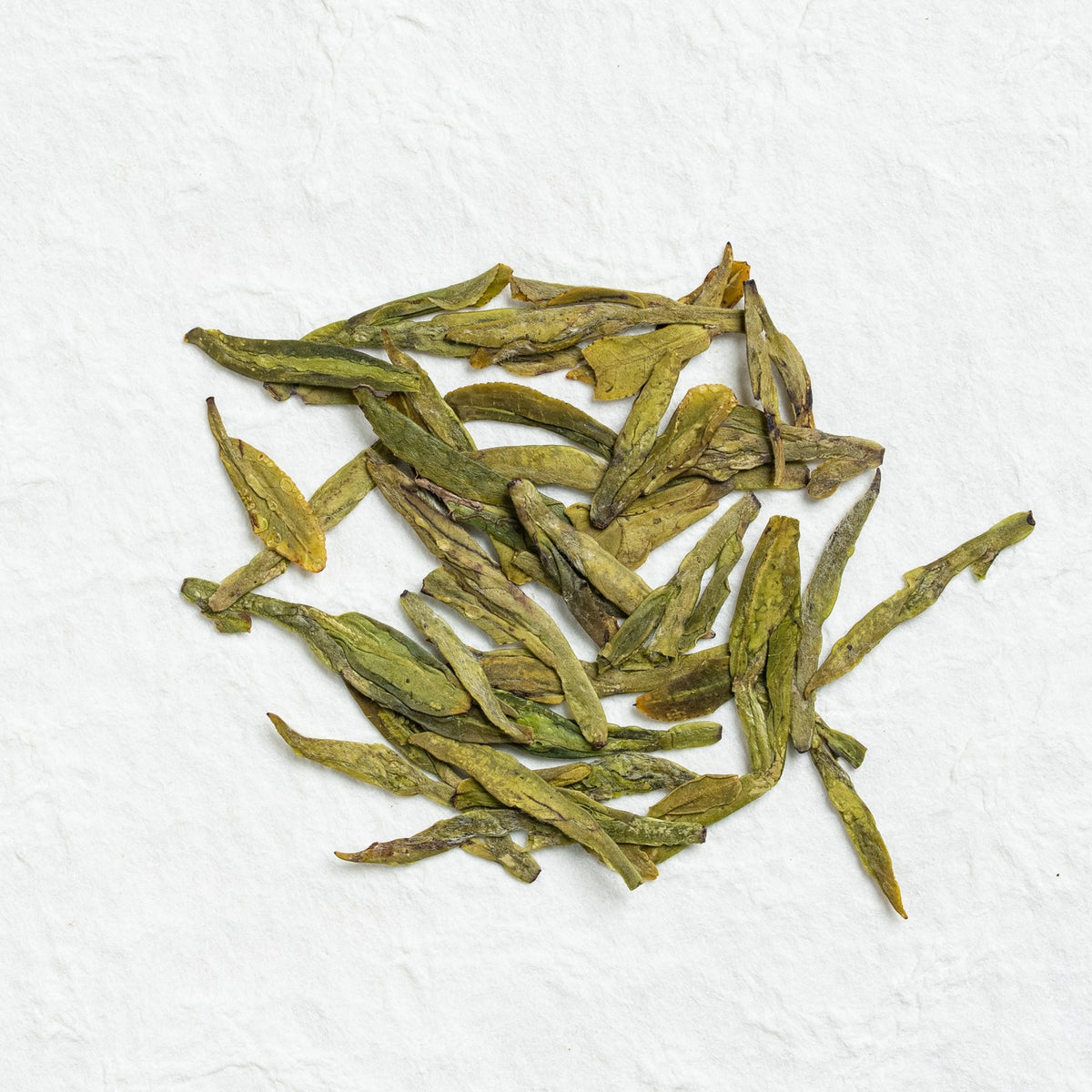 Dry loose leaves of West Lake Longjing Green Tea