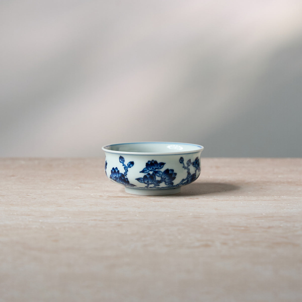 Front view of White Magnolia Blue-and-White Porcelain Tea Cup