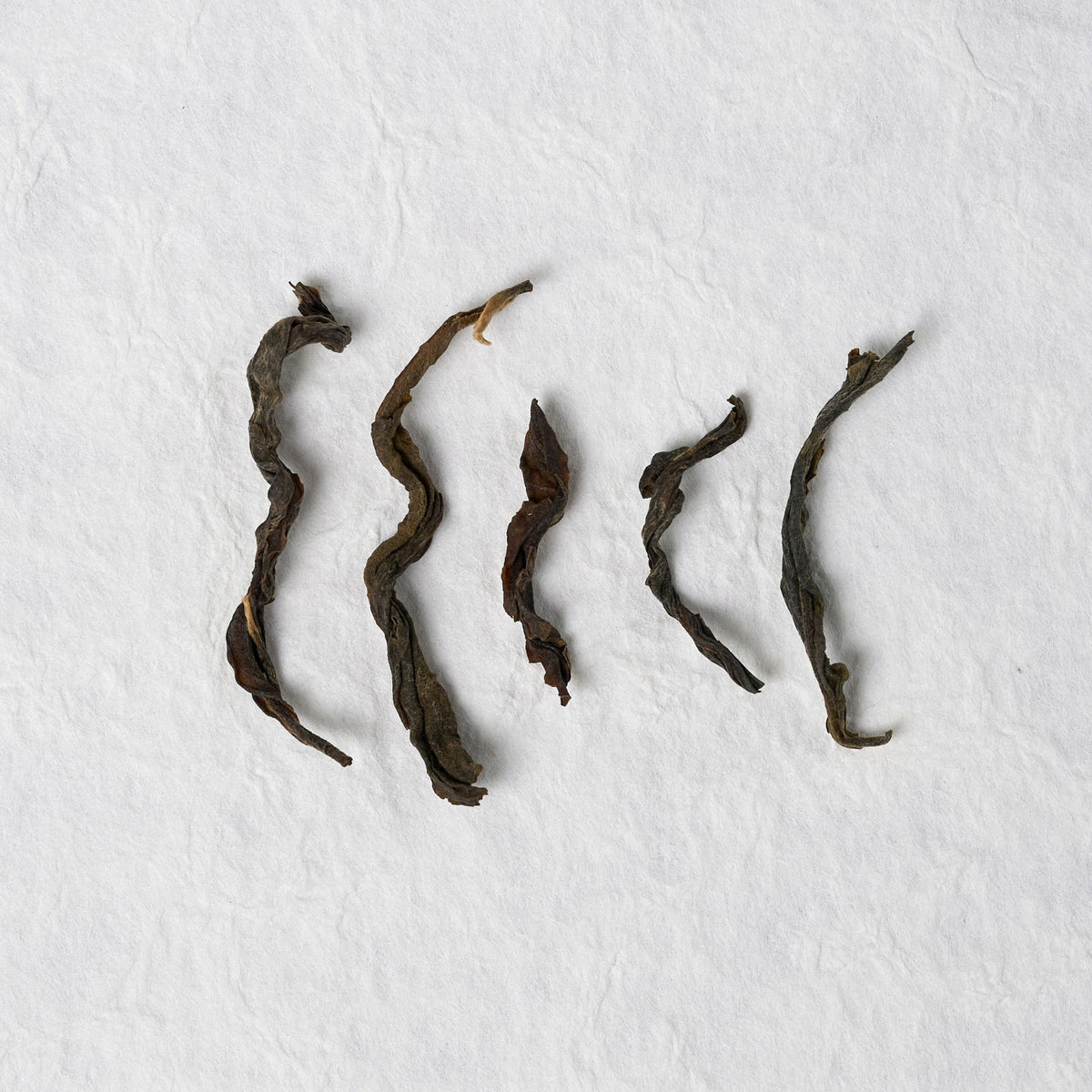 Close-up of Yiwu Raw Pu-erh Tea loose tea leaves