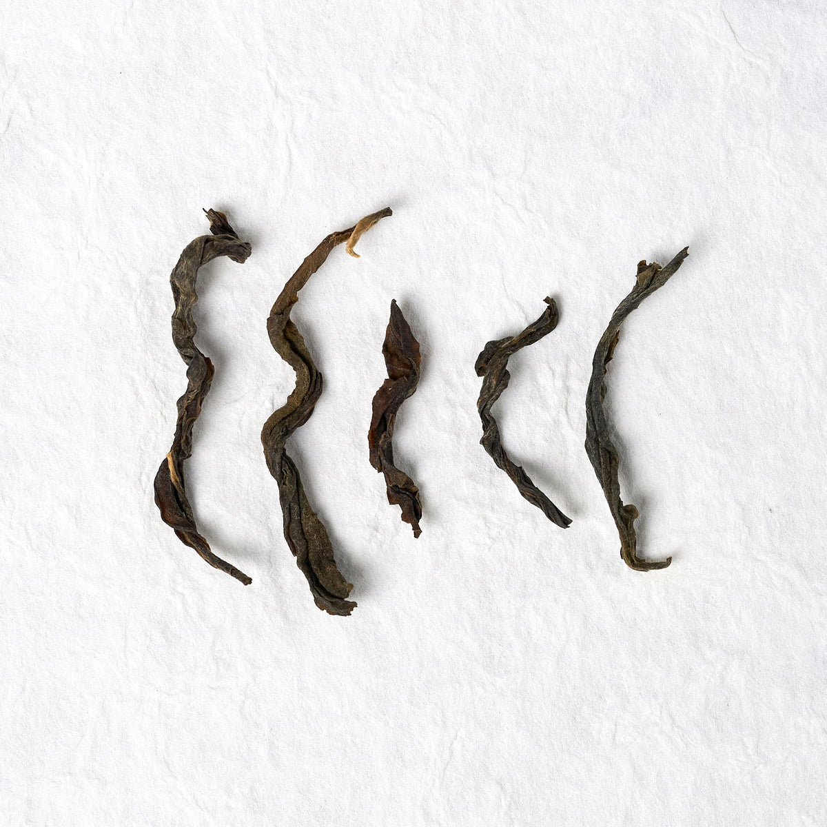 Close-up of Yiwu Raw Pu-erh Tea loose tea leaves