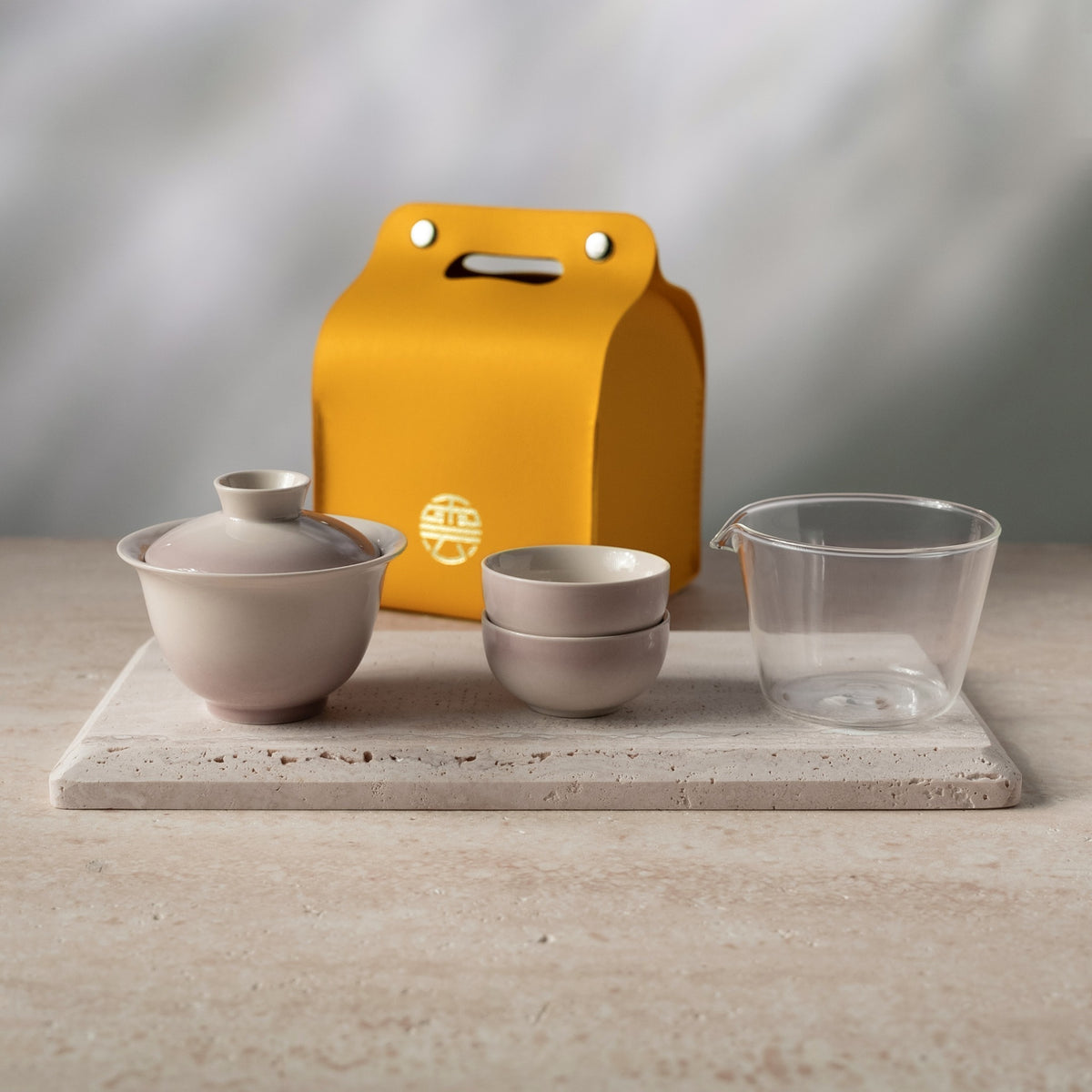 Gongfu tea starter set with porcelain gaiwan, two tea cups, glass fairness pitcher and Yunsho carrying case