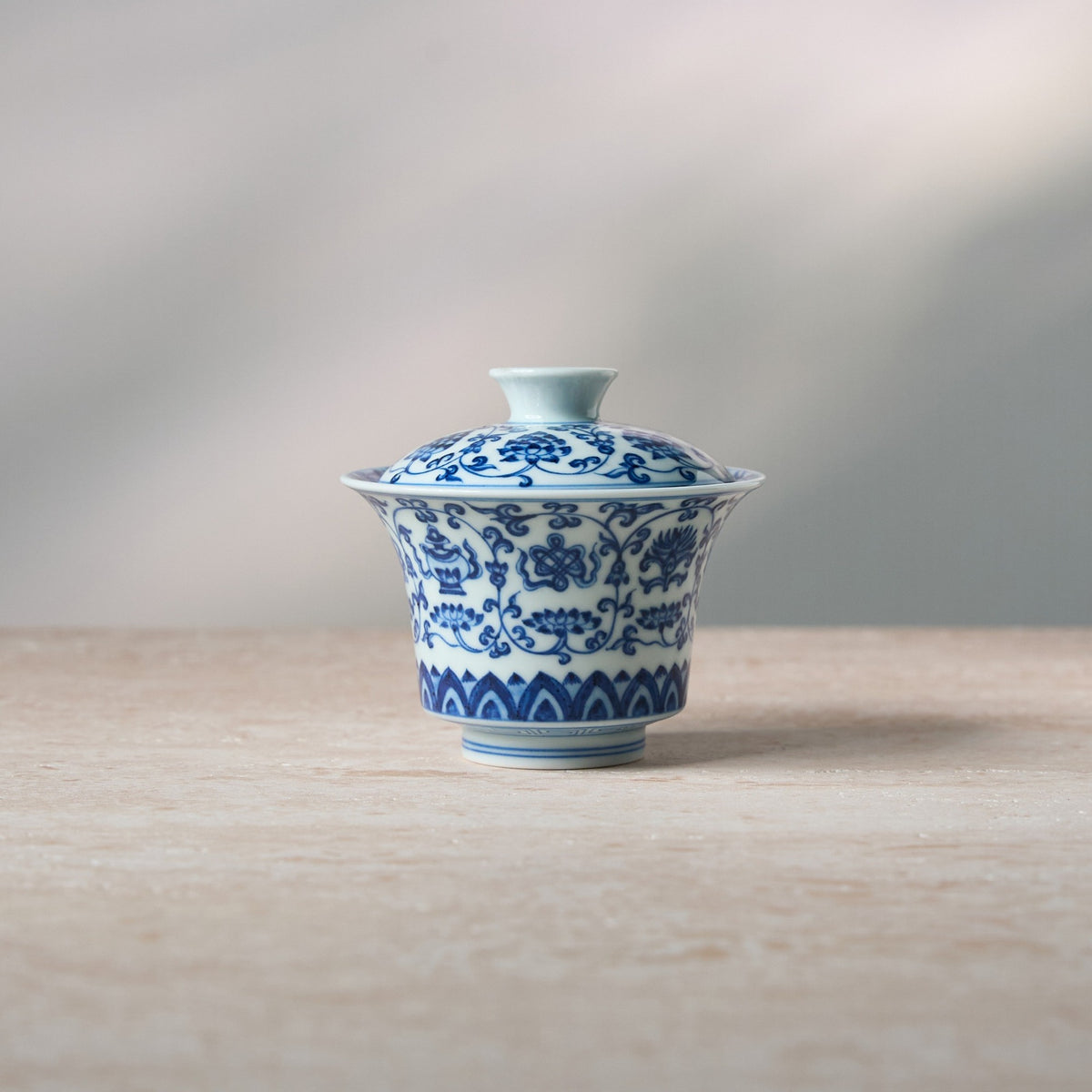 Front view of Eight Treasures & Scrolling Lotus Porcelain Gaiwan