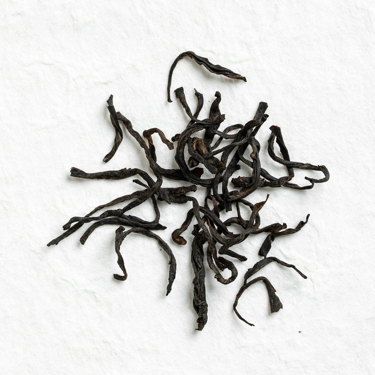 Dry loose leaves of Feizi Xiao Wuyi Black Tea