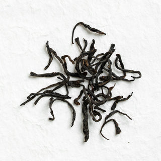 Dry loose leaves of Feizi Xiao Wuyi Black Tea