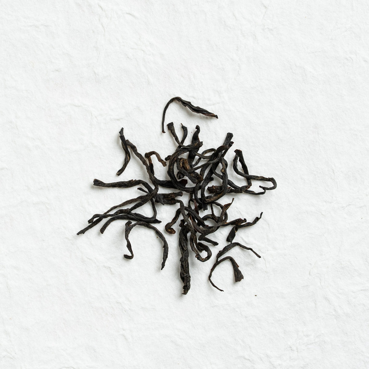 Dry loose leaves of Feizi Xiao Wuyi Black Tea