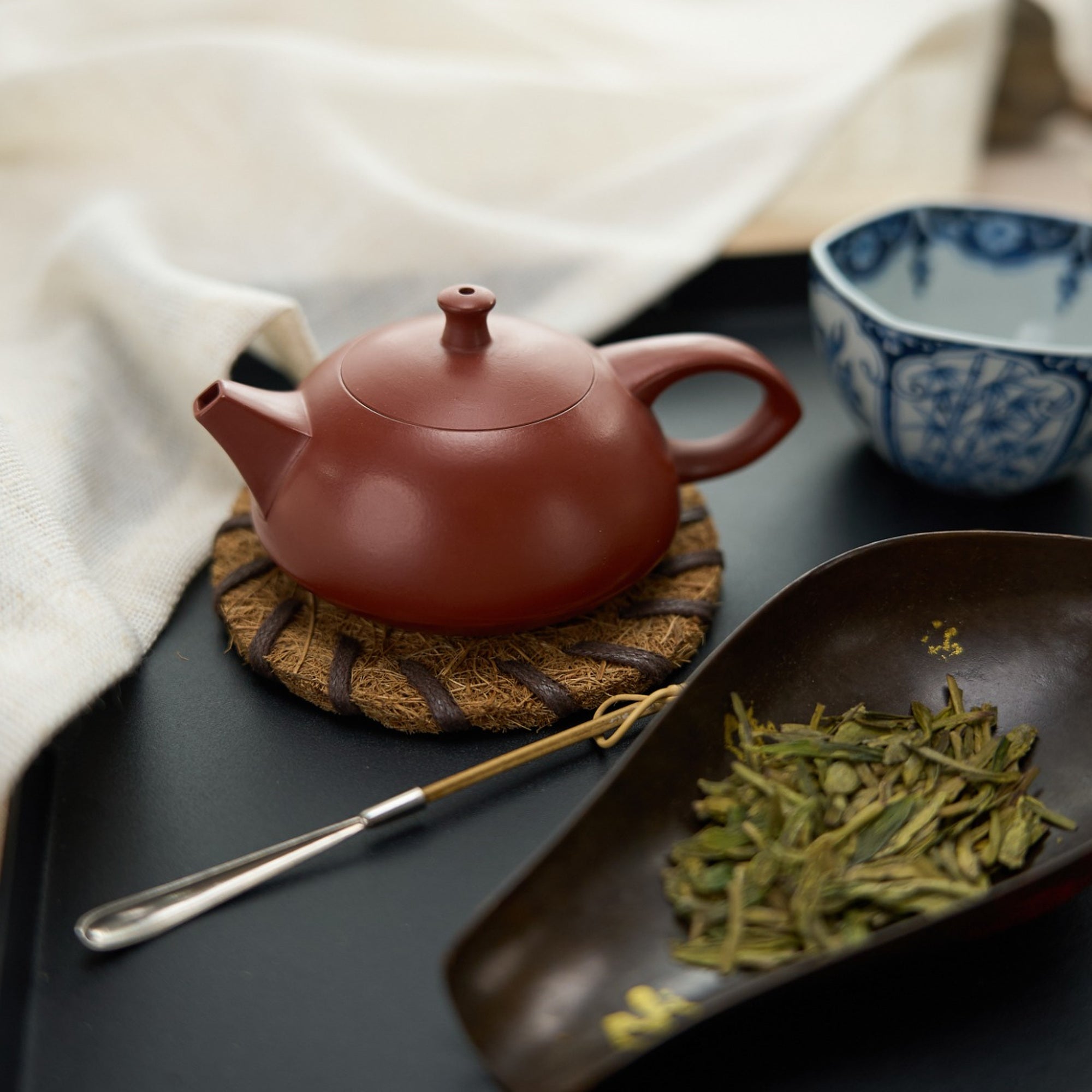 Jade Rabbit Chaozhou Zhuni Hand-Thrown Teapot in a styled gongfu tea setting