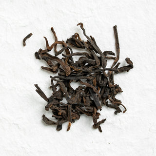 Dry loose leaves of Liubao Tea