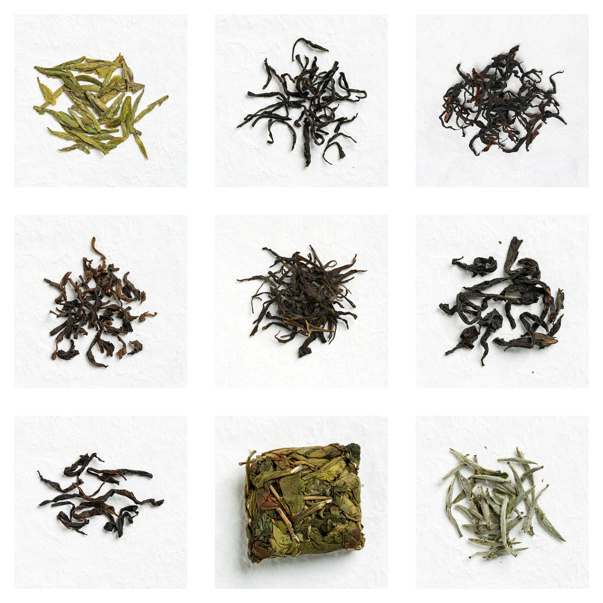 Nine dry-leaf teas arranged in a three-by-three grid for The 9 Origins Tea Sampler
