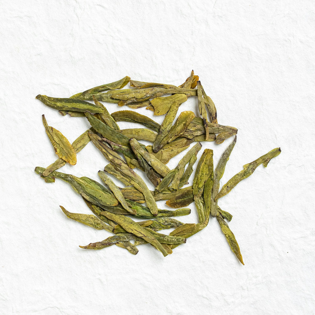 Dry loose leaves of West Lake Longjing Green Tea