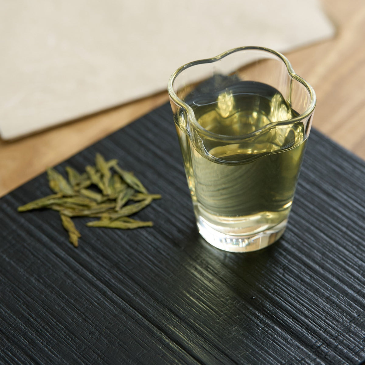 Styled tea scene featuring West Lake Longjing Green Tea