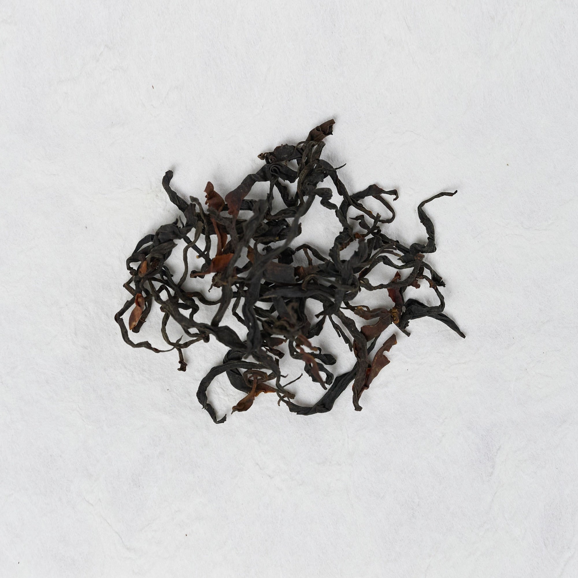 Dry loose leaves of Wild Forest Sun-Dried Black Tea