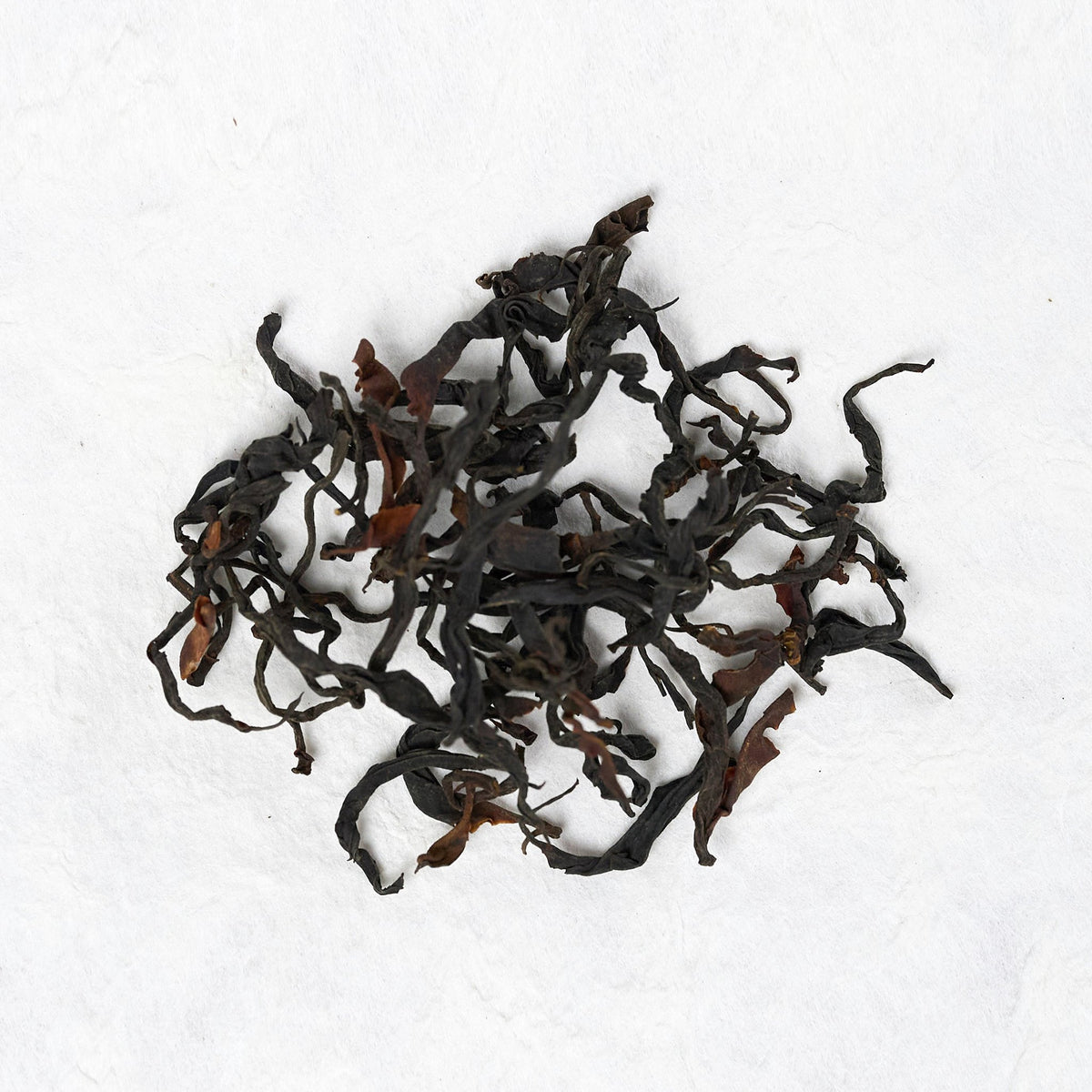 Dry loose leaves of Wild Forest Sun-Dried Black Tea