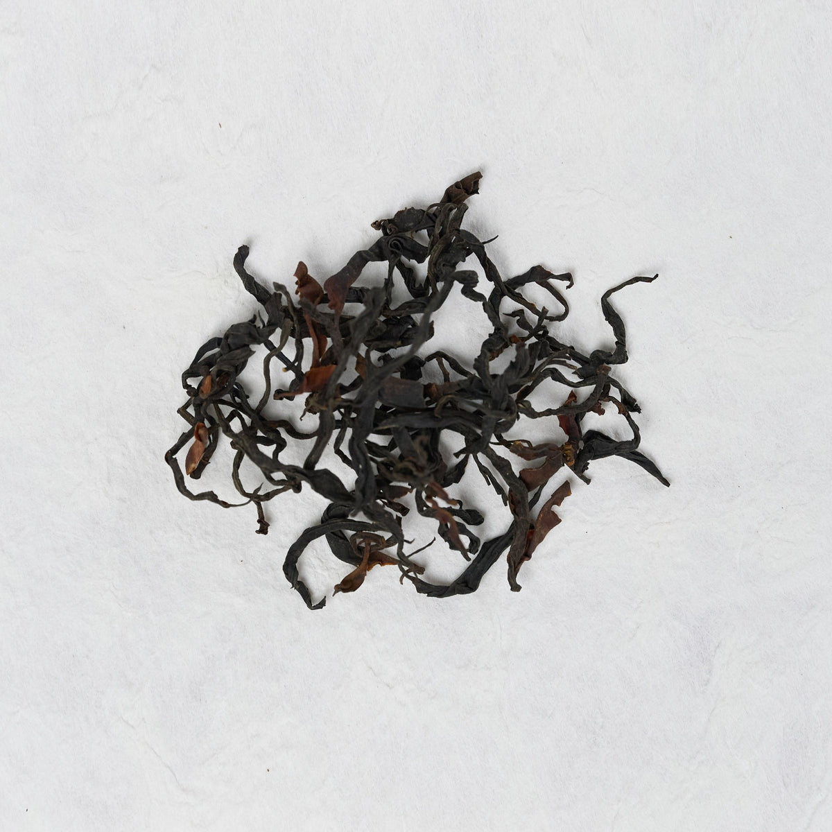 Dry loose leaves of Wild Forest Sun-Dried Black Tea