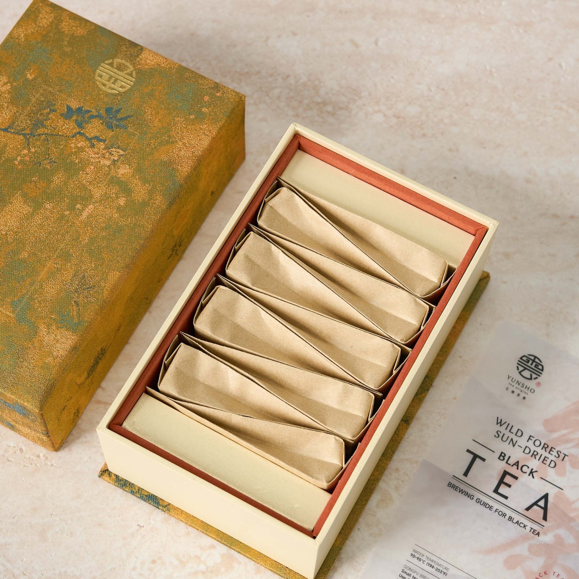 Open box packaging for Wild Forest Sun-Dried Black Tea