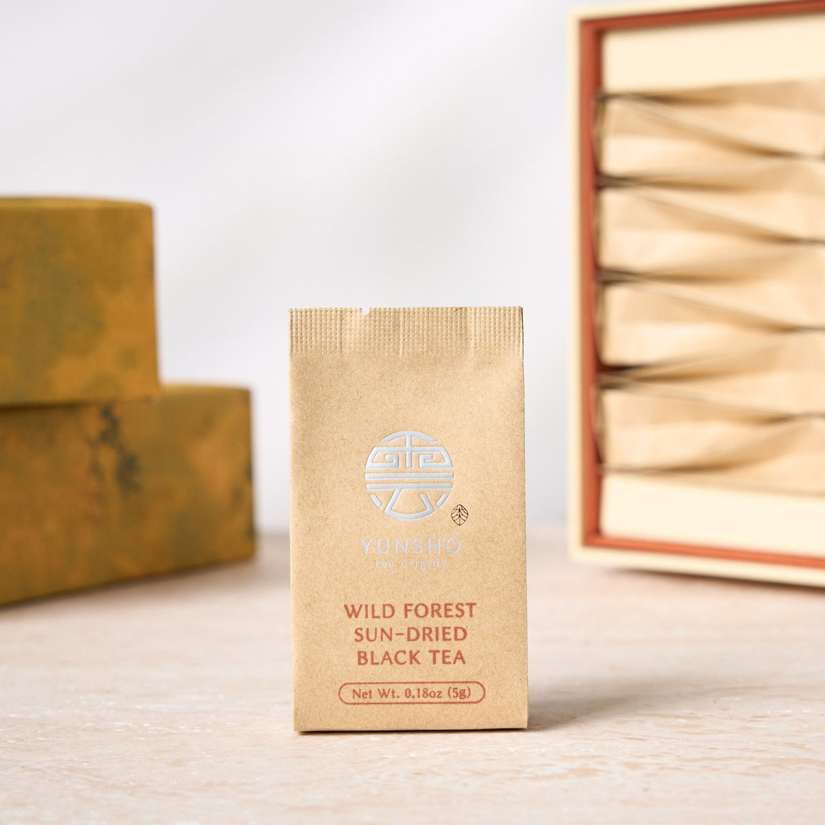 Individual sachet packaging for Wild Forest Sun-Dried Black Tea