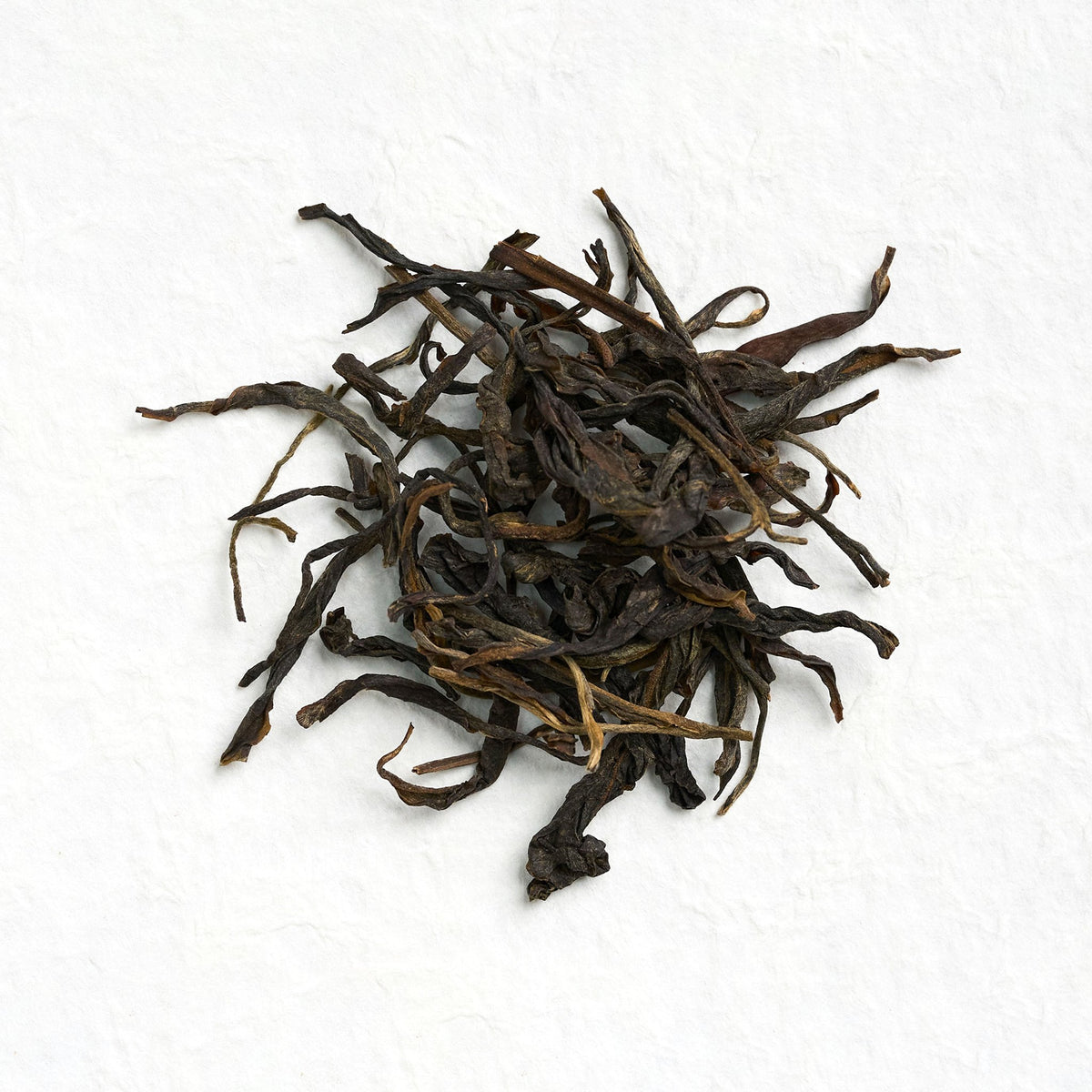 Dry loose leaves of Yiwu Raw Pu-erh Tea