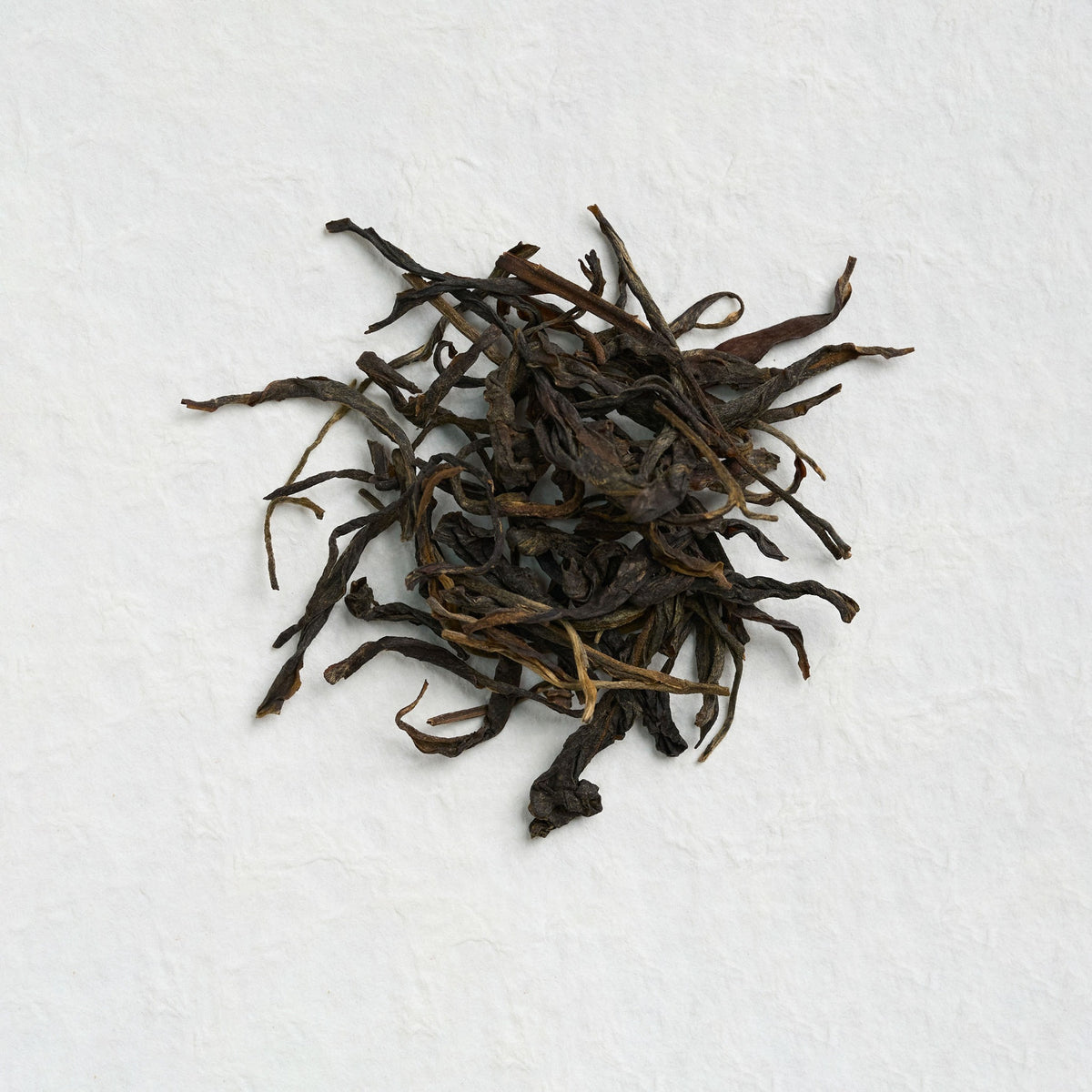 Dry loose leaves of Yiwu Raw Pu-erh Tea