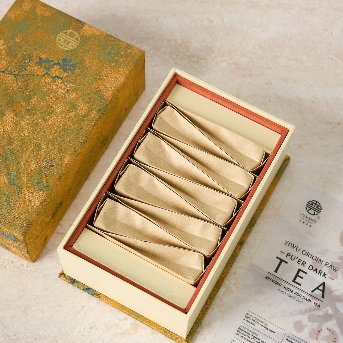 Open box packaging for Yiwu Raw Pu-erh Tea