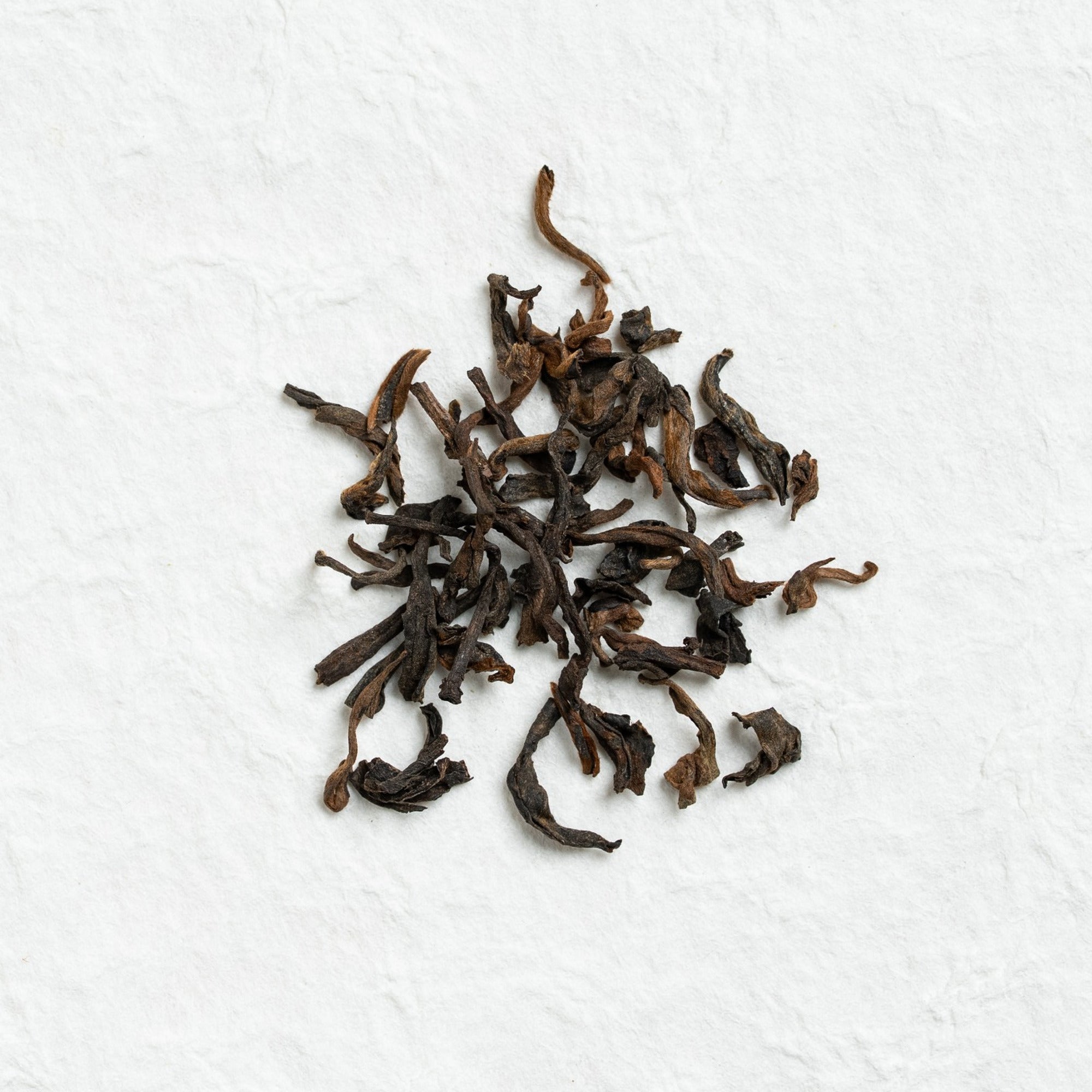 Dry loose leaves of Yiwu Ripe Pu-erh Tea