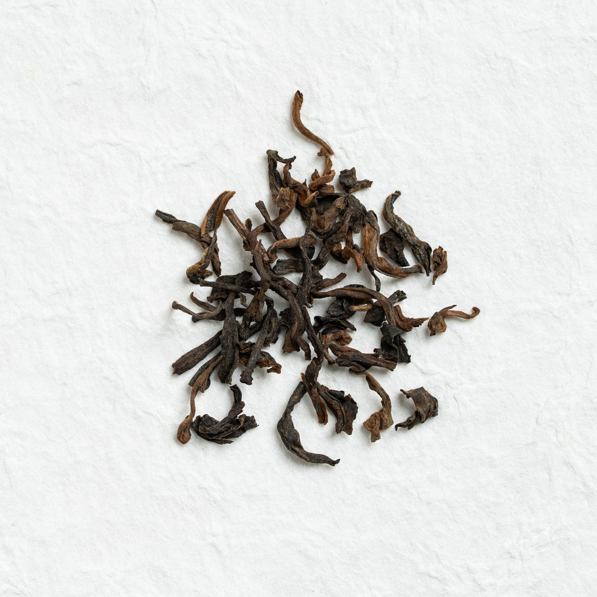 Dry loose leaves of Yiwu Ripe Pu-erh Tea