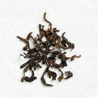 Dry loose leaves of Yiwu Ripe Pu-erh Tea