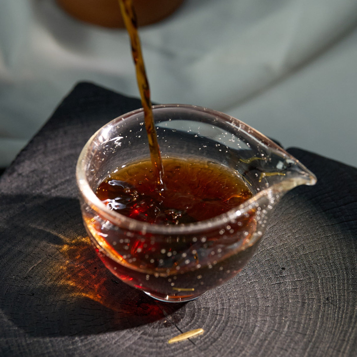 Styled tea scene featuring Yiwu Ripe Pu-erh Tea