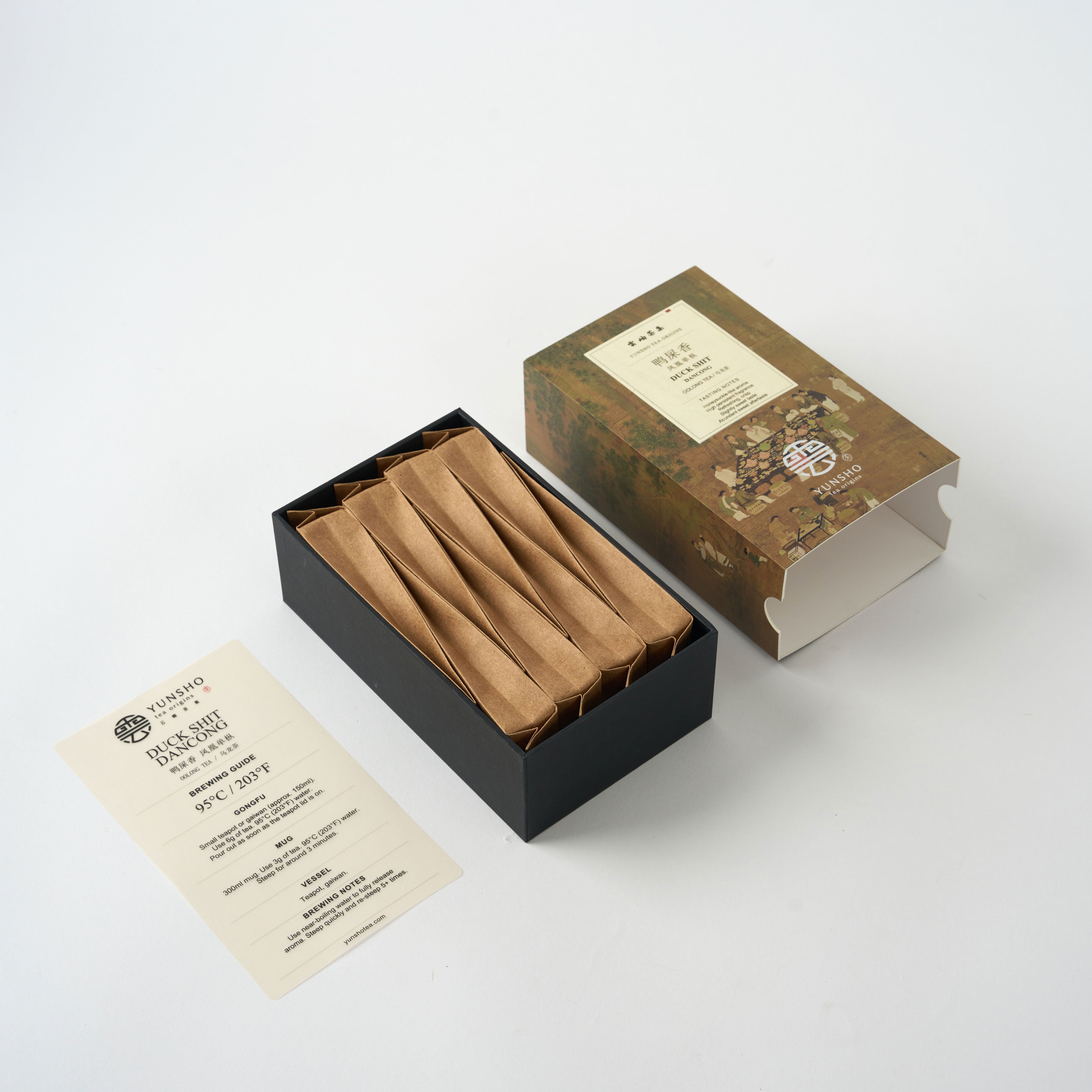 Open Duck Shit Dancong Oolong Tea Classic Box with individually wrapped tea pouches and a tea information card